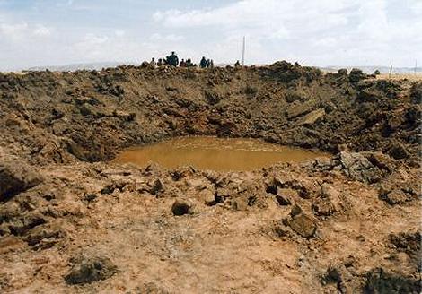 The only known chondritic impact crater on Earth, at Carancas, Peru (66' wide x 18' deep)