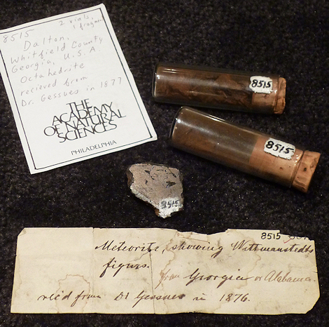 11.766 gram windowed fragment with two vials of small fragments and labels