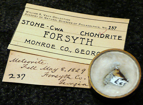 1.411 gram crusted fragment with labels