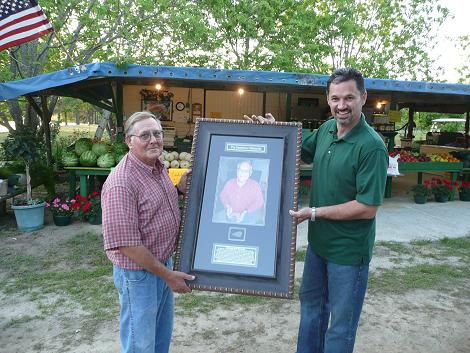Presenting Mr. Cannon with a framed slice