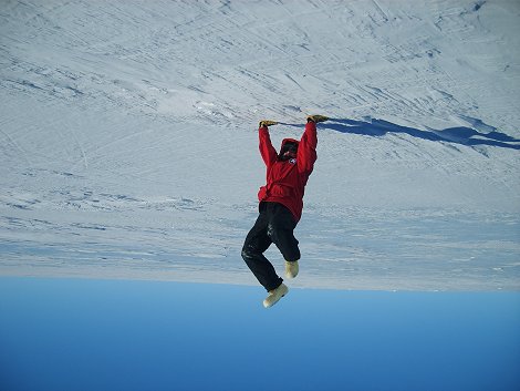 Marc Fries holding on to the bottom of the Earth while hunting meteorites in Antarctica